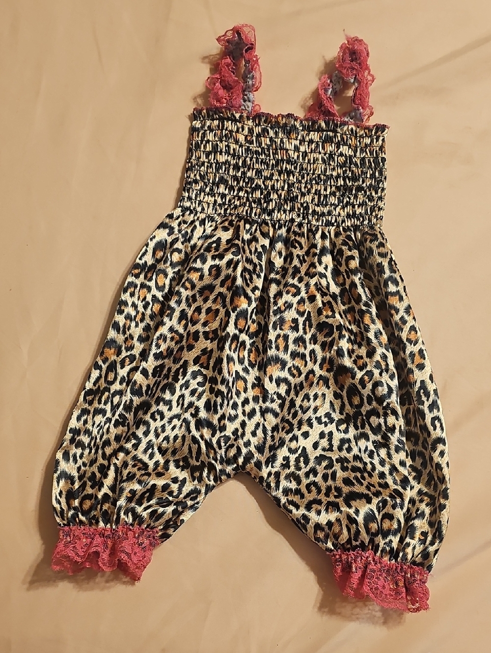 Girls Leopard Print Smocked Romper with Pink Lace Accents